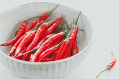Close-up of red chili peppers in bowl
