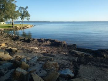 Scenic view of sea against clear sky
