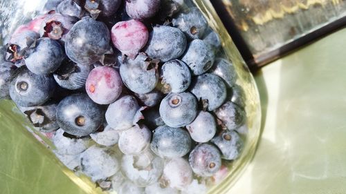 High angle view of blueberries in jar