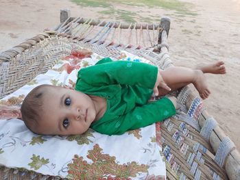 High angle portrait of cute baby lying down