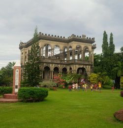 View of building against cloudy sky