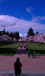 Silhouette of woman against cloudy sky