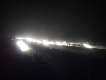 Illuminated street light at night