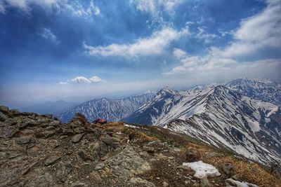 Scenic view of snowcapped mountains against sky