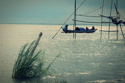 Man on sea against sky