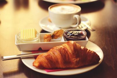 Close-up of breakfast served on table