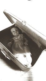 Low angle view of boy against clear sky