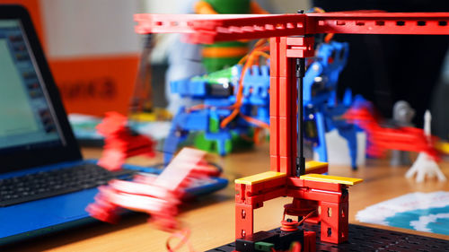 Close up of red toys on table