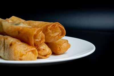 Close-up of bread in plate on table
