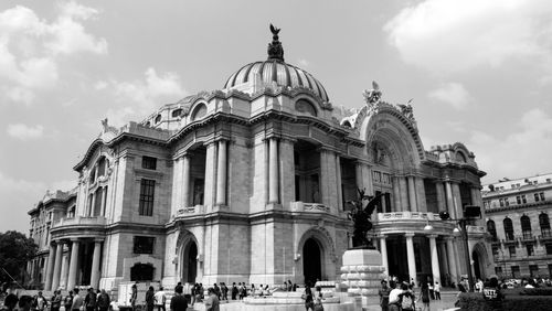 Group of people in front of historical building