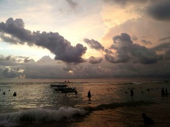 Scenic view of sea against cloudy sky