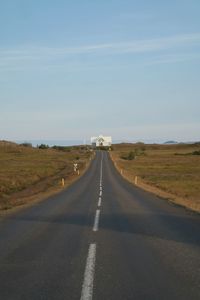 Road amidst landscape against sky