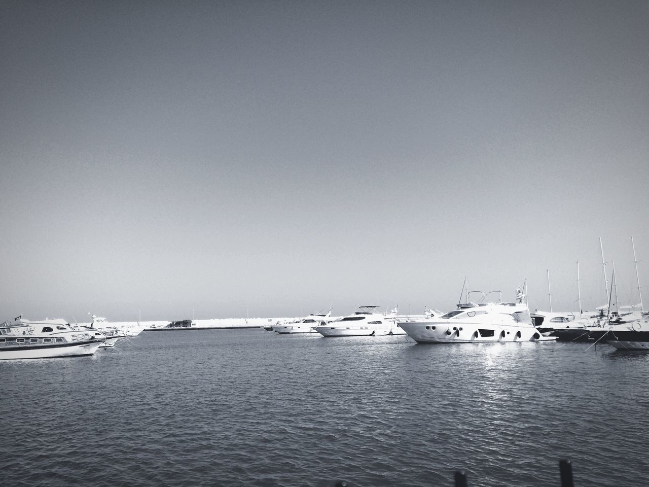 nautical vessel, transportation, clear sky, copy space, water, mode of transport, sea, boat, waterfront, moored, nature, tranquil scene, tranquility, sailboat, beauty in nature, scenics, day, outdoors, no people, mast