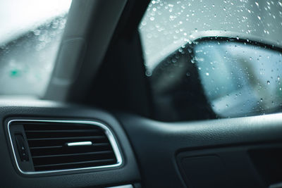 Close-up of wet car window