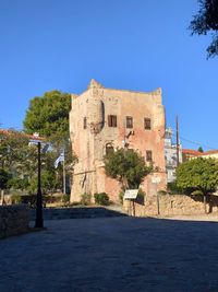 Old building against blue sky