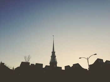 Low angle view of buildings against clear sky