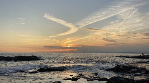 Scenic view of sea against sky during sunset