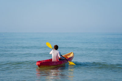 man paddling a