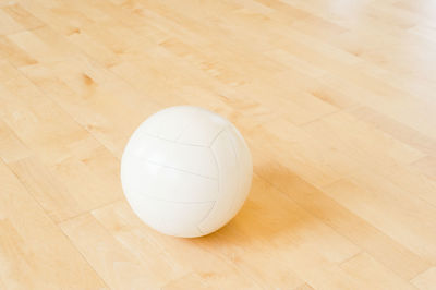 Close-up of on volleyball on court