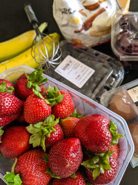 High angle view of strawberries on table