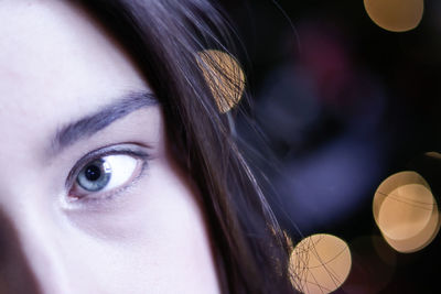 Close-up portrait of young woman