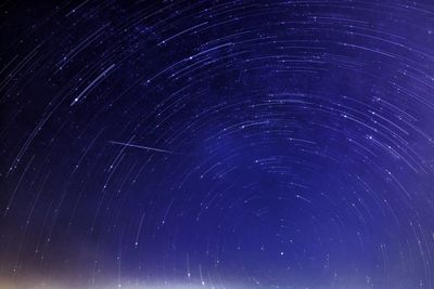 Low angle view of star field against sky at night