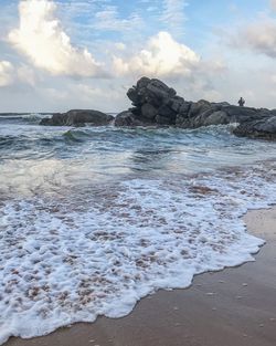 Scenic view of beach against sky