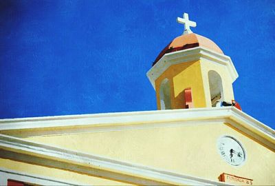 High section of church against blue sky