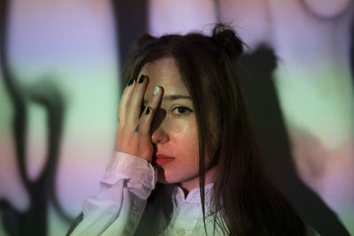 Close-up portrait of young woman