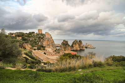 Panoramic view of sea against cloudy sky