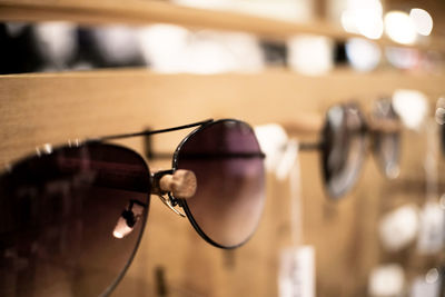 Close-up of sunglasses against blurred background