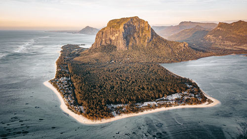 Aerial view of island amidst sea