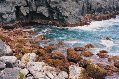 Scenic view of rocks in sea