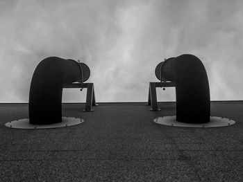 Table and tables against sky