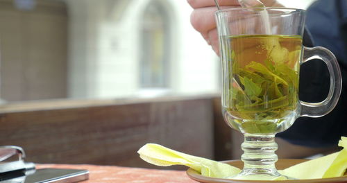 Close-up of tea in glass on table