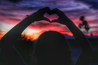 Close-up of man at sunset