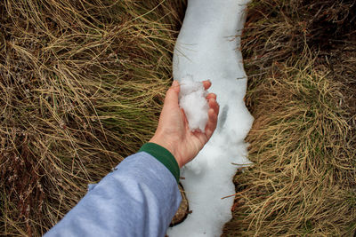 Low section of man legs on field