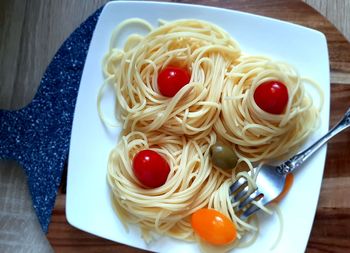 High angle view of fruit salad in plate on table