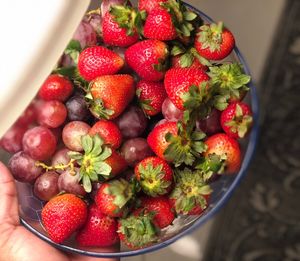 High angle view of strawberries in bowl on table