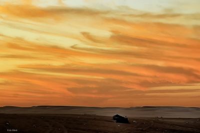 Scenic view of sea at sunset