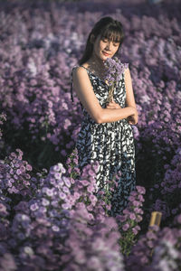 Full length of woman standing on field