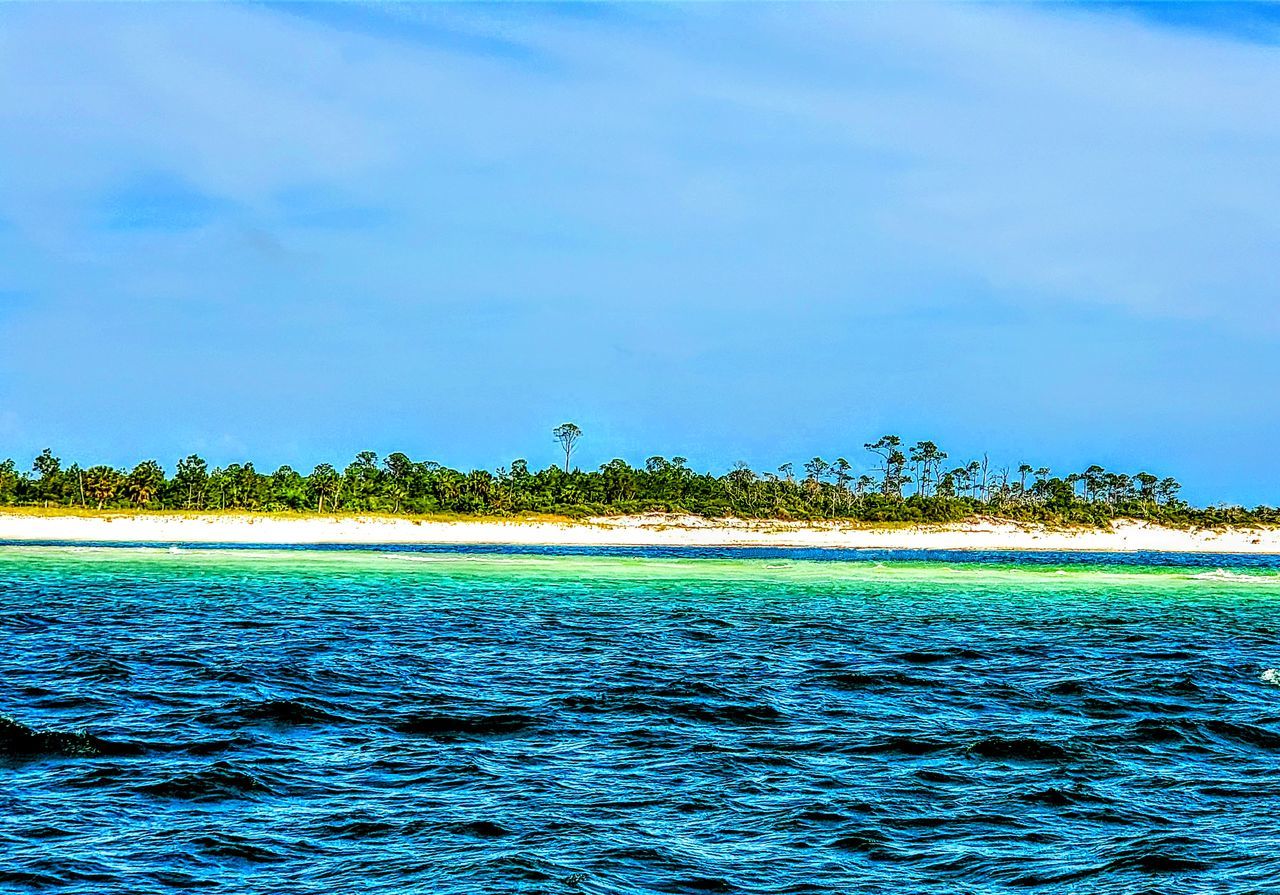 water, sea, sky, horizon, beauty in nature, scenics - nature, shore, ocean, nature, land, tranquility, tropical climate, blue, tree, tranquil scene, no people, cloud, island, idyllic, travel, travel destinations, coast, day, beach, outdoors, islet, plant, body of water, environment, bay, vacation, tourism, holiday, trip, palm tree, wave, waterfront, rippled, seascape, lagoon, archipelago, landscape, non-urban scene, summer