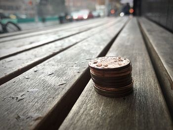 Coins on table during rainy season