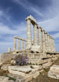 Low angle view of old ruins against sky