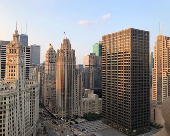 Modern buildings in city against sky