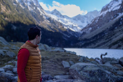 Rear view of woman looking at lake