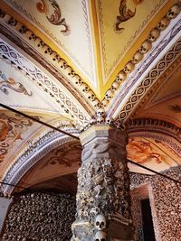 Low angle view of ornate ceiling of building