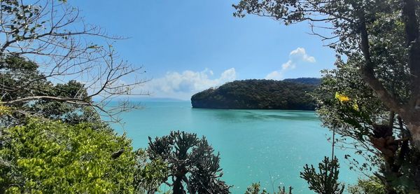 Scenic view of bay against sky