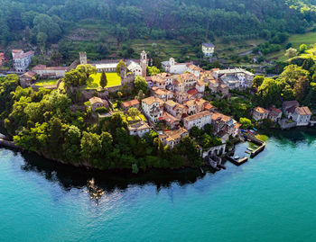 High angle view of river amidst buildings in town