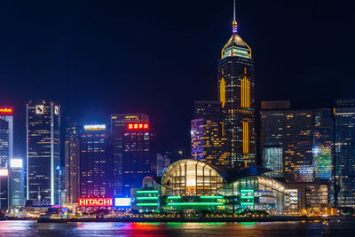 Illuminated buildings in city at night